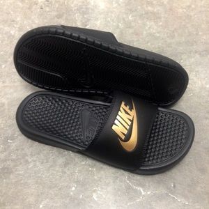 gold nike slides